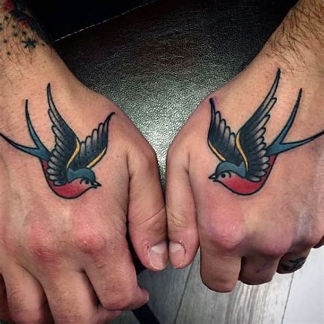 Hand Swallow Tattoos