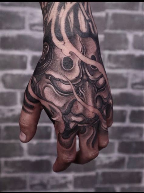 Hand Tattoos Of Faces
