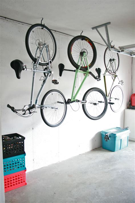 hanging bikes from ceiling apartment Google Search Bike wall storage, Bike storage garage