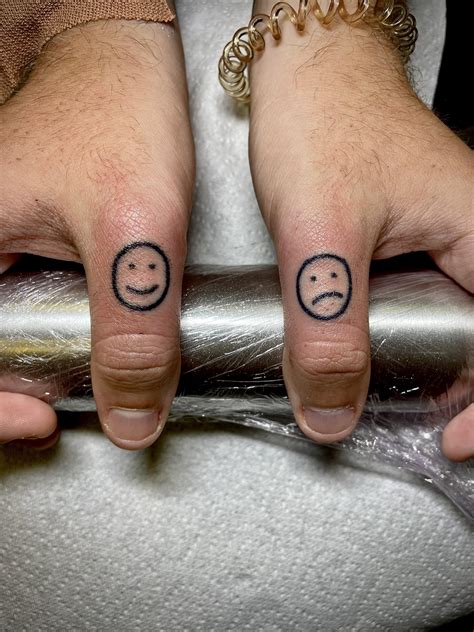 Happy And Sad Face Tattoo