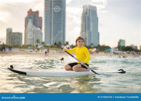 Happy Paddle Surfer