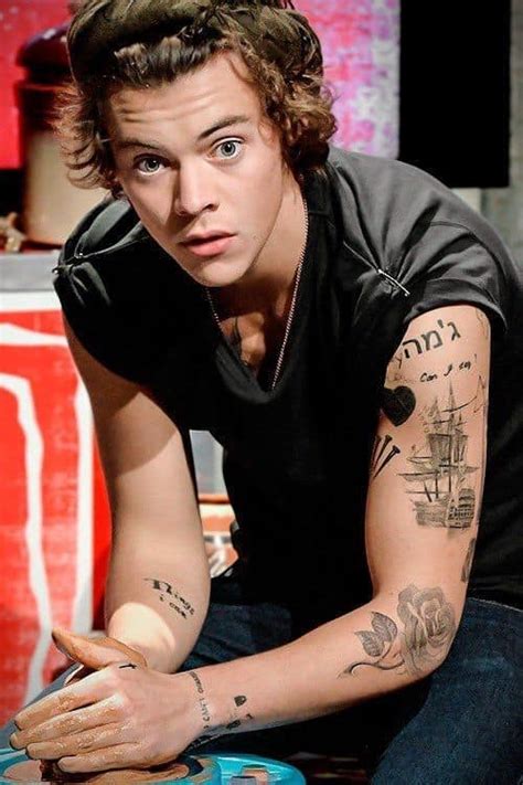 Harry Styles gets large butterfly tattoo on his ribcage