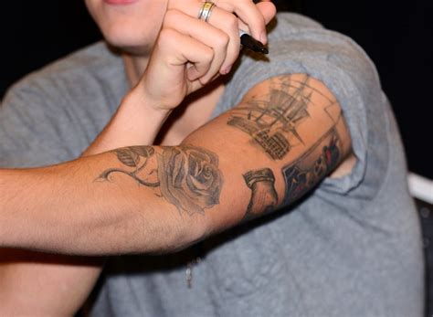 Harry Styles Tattoos Left Arm