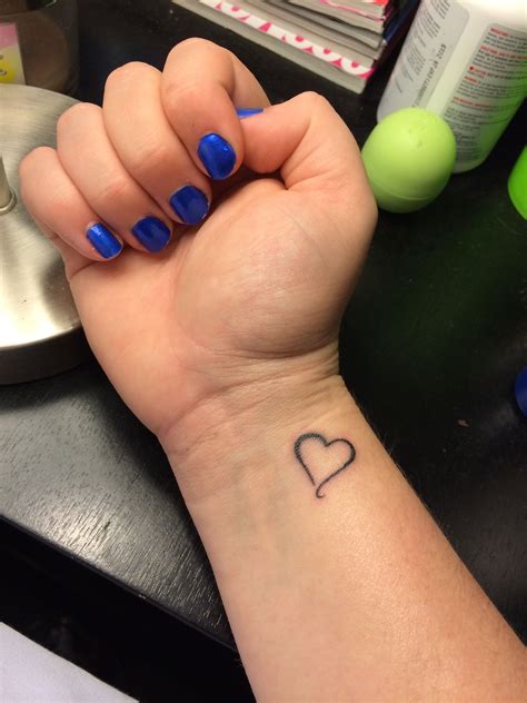 Tiny heart wrist tattoo 💙💚💛💜💖 j2honeymoon Thank you