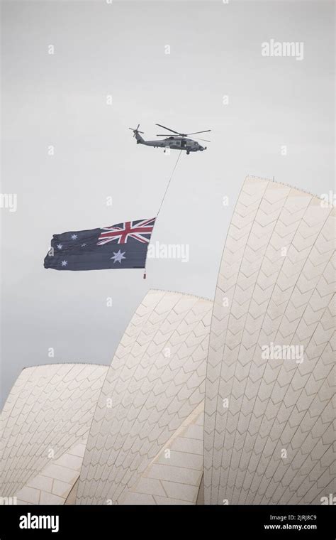 Helicopter flying over Sydney Opera House