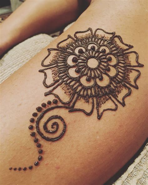 Tattoo Henna Mehndi on the upper back Lotus Flower