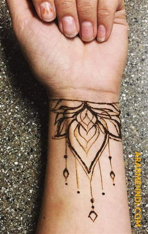 henna tattoo wrist Henna hand tattoo, Hand henna, Tattoos