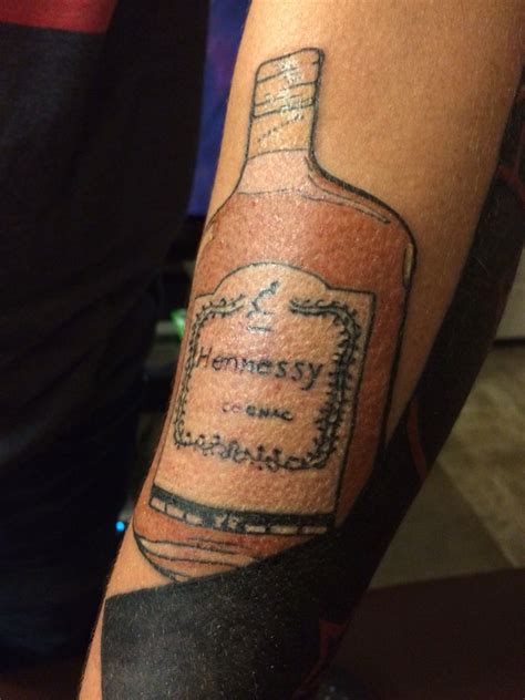 Small Hennessy bottle by Jose at Ace of hearts in Long