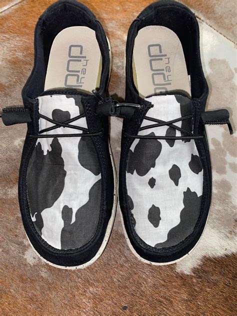 Get Cow-nted In Style with Hey Dude Cow Print Shoes
