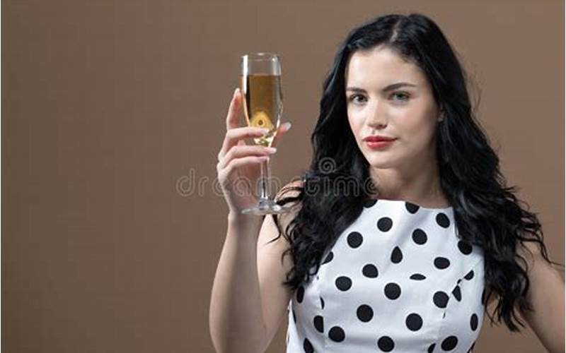 Holding A Champagne Flute