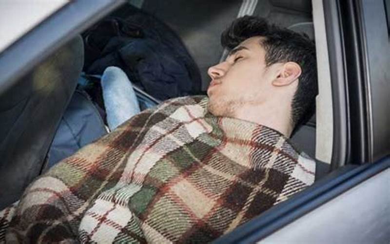 Homeless Man Sleeping In Car