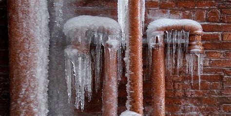 Homeowner checking pipes for ice