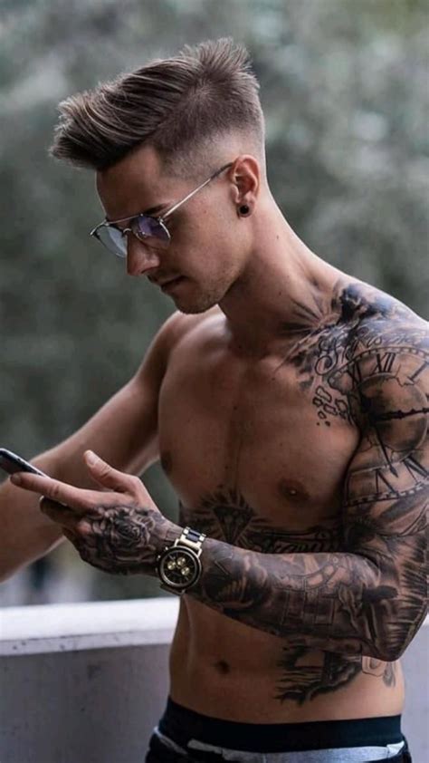 Unleashing the Charisma of Inked Adonises: Hottest Tattooed Guys to Follow