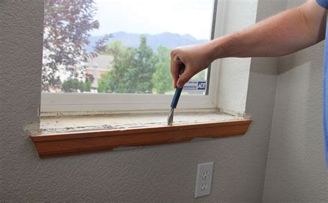 How To Replace an Interior Window Sill two purple couches