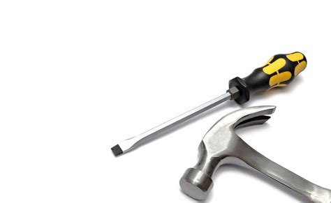 Locksmith Making Installation of Door Lock with Screwdriver. Stock