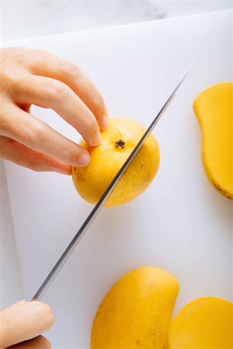 Unlock the Deliciousness: Learn How to Cut Open a Mango in Easy Steps