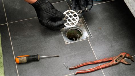 How To Fix A Leaking Shower Drain Replace A Shower Drain From The Top Diy Family Handyman