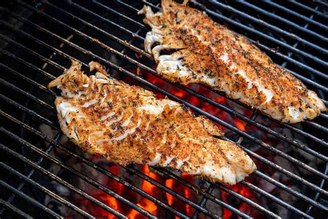 Culinary Tutorial: Master the Art of Grilling Red Snapper Fillets with Skin for a Flavorful Delight
