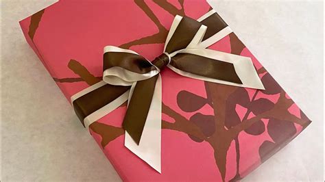 Master the Art of Tying a Perfect Bow with Two Ribbons - A Step-by-Step Guide