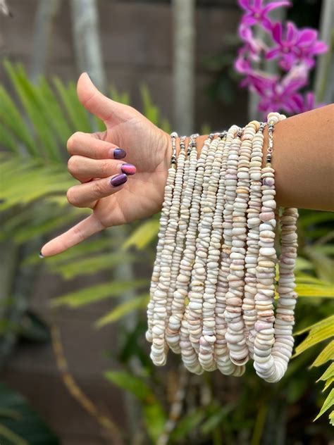 Step-by-Step Guide on How to Tie a Puka Shell Necklace for a Perfect Beachy Look