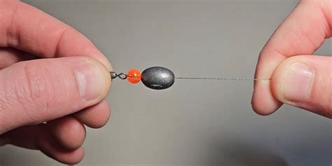 Master the Art of Fishing - Learn How to Tie a Sinker to Your Fishing Line like a Pro!