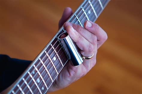 Slide Your Way to Success: A Comprehensive Guide on How to Use a Slide for Guitar Playing
