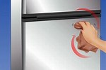 How to Get Little Dent Out of a White Fridge