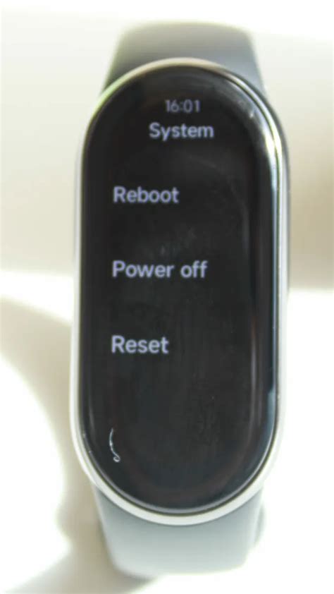 How to Reboot Mi Band 3 and 4