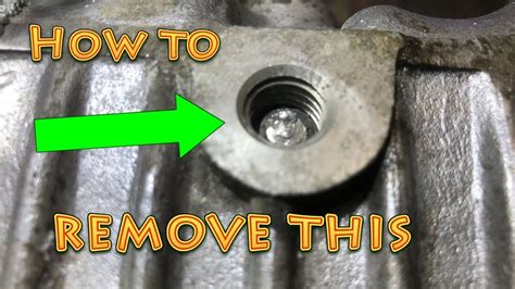 Image of broken head bolt and surrounding bolts