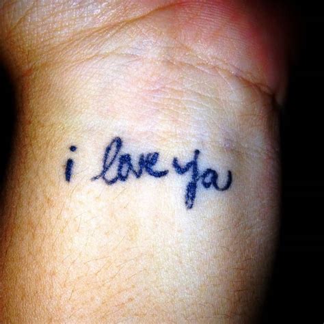 Nana's Handwriting "i love you" small wrist tattoo 