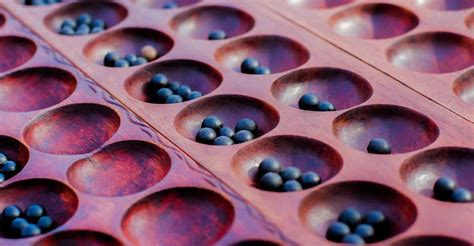 Igisoro Rwandan Table Game: Play & Learn with a Local