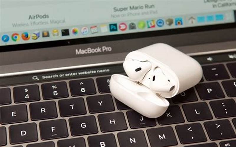 Image Of Airpods And Macbook