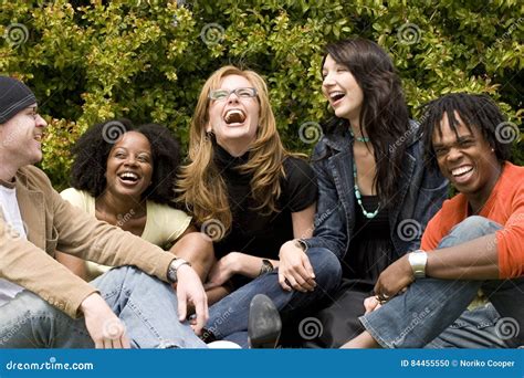 Group of students laughing and talking