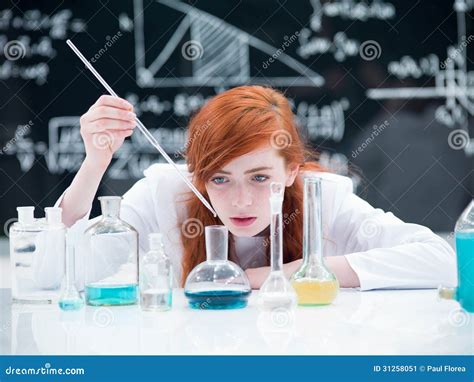 Student conducting an experiment in a laboratory