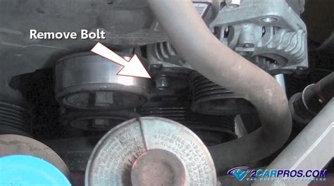 Removing mounting bolts from the alternator