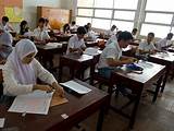 Indonesian Class 1 Students Learning to Write