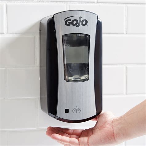 Insert and Turn the Key in Gojo Soap Dispenser