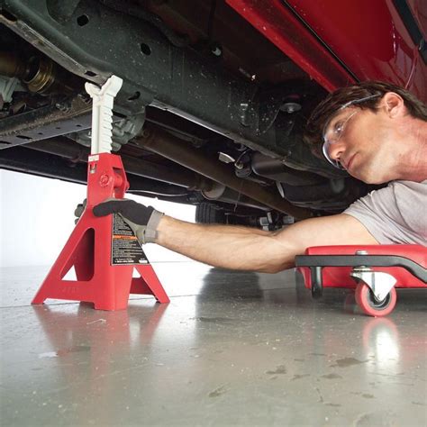 Center Image "Inserting Jack Stands"
