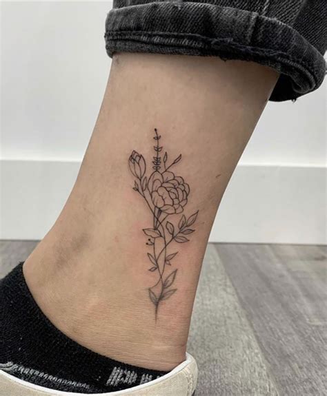 Inner ankle tattoo done by Travis Yelp