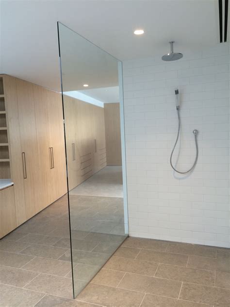 Shower wall panel installation problems solved with custom trim, windows and niches
