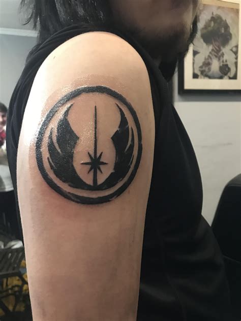 Got my first tattoo of the Jedi order symbol done by Reece