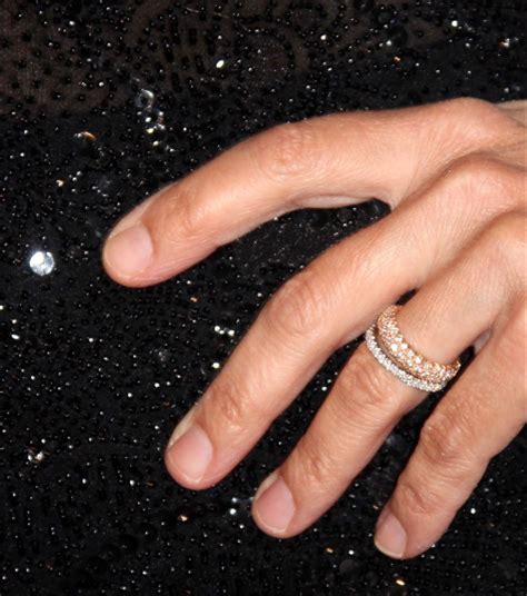 The Enchanting Elegance of Julia Garner's Sparkling Wedding Ring: A Symbol of Eternal Love and Pure Bliss!