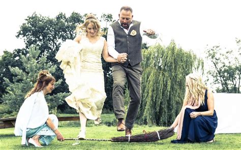 Leap into Love: The Enduring Tradition of Jumping Over the Broom at Weddings