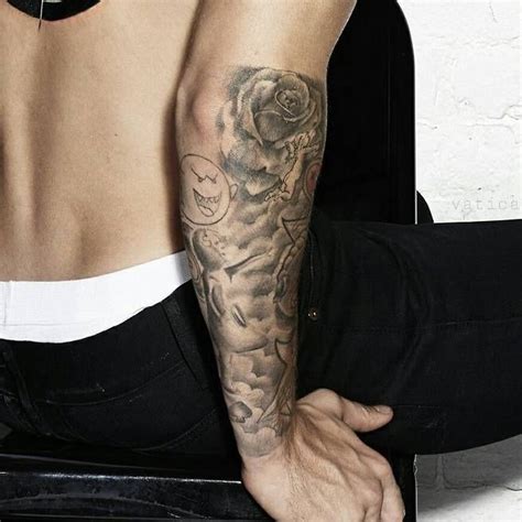 Justin Bieber's Koi Fish Tattoo on His Arm PopStarTats