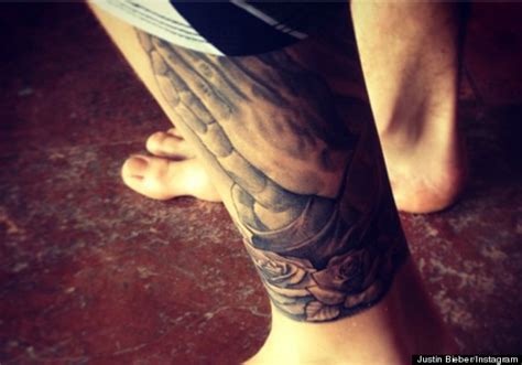 Justin Bieber sports new Jesus tattoo on back of leg