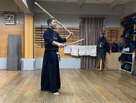 The kendo sensei demonstrating techniques to workshop participants