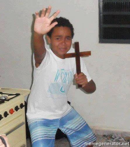 Kid Holding Cross Scared Meme