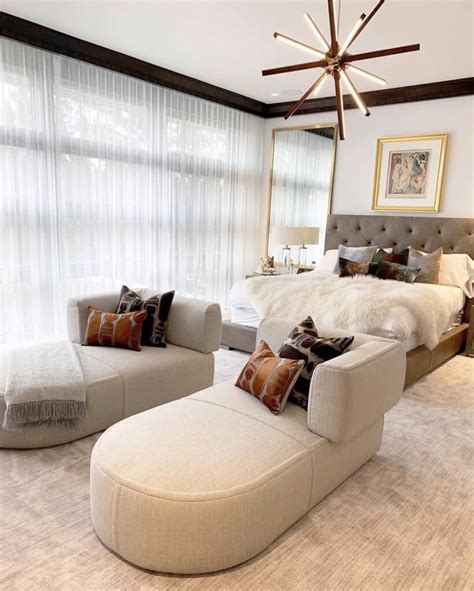 Large bedroom with canopy bed and separate sitting area