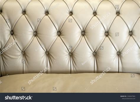 Leather Sofa With Buttons