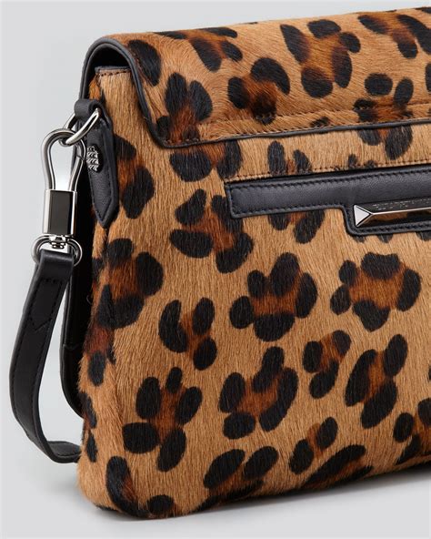 Unleash Your Wild Side with a Leopard Print Crossbody Bag!
